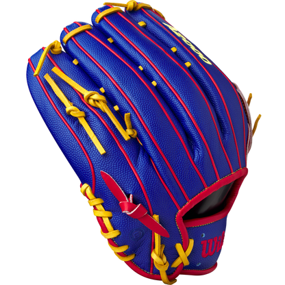 The Wilson A2000 1799SS 12.75" Pete Crow-Armstrong GM Baseball Glove (GOTM January 2025, WBW1034771275) features blue leather, red accents, yellow laces, embossed stitching, and the Wilson logo near the thumb.