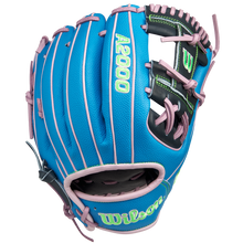 The Wilson A2000 1786SS 11.5" GOTM March 2025 glove (WBW103479115) features blue SuperSkin, pink lacing and trim, a black palm area, and green embroidered lettering. Shown on a white background. Brand: Wilson.