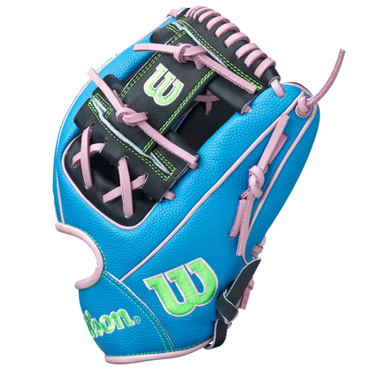 The Wilson A2000 1786SS 11.5" Baseball Glove (GOTM March 2025, WBW103479115) features a blue design with black, green, and pink accents, pink laces, green W logos, Pro Stock leather, and is shown upright on a white background.