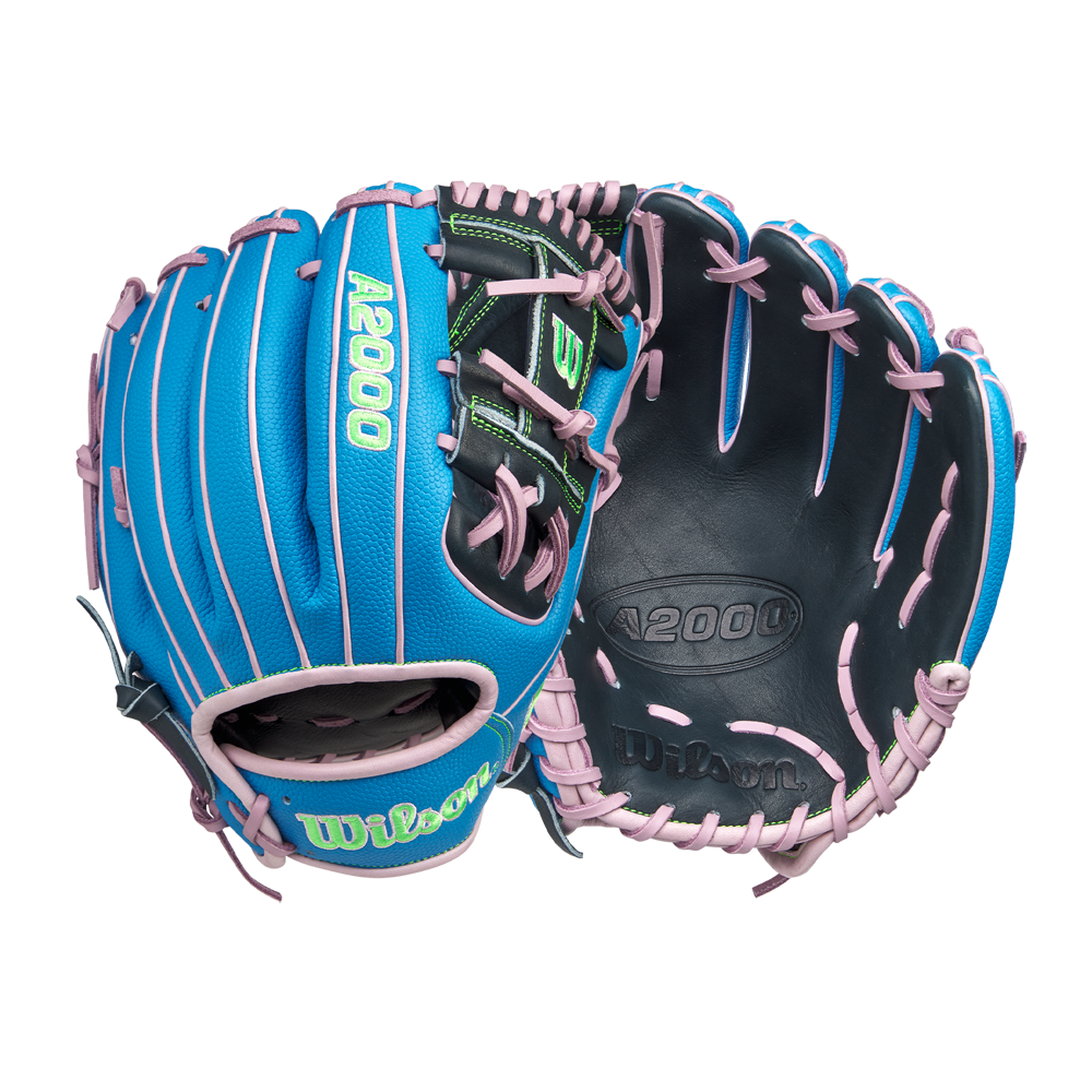 The Wilson A2000 1786SS 11.5" Baseball Glove (GOTM March 2025, WBW103479115) features Pro Stock leather and SuperSkin in blue with pink laces, green accents, and a black palm, shown on a white background.