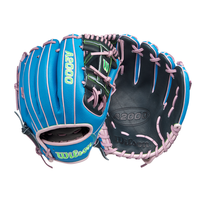 The Wilson A2000 1786SS 11.5" Baseball Glove (GOTM March 2025, WBW103479115) features Pro Stock leather and SuperSkin in blue with pink laces, green accents, and a black palm, shown on a white background.