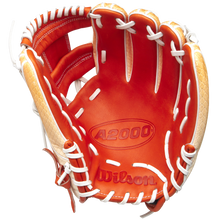 The Wilson A2000 1975SS 11.75" Baseball Glove (GOTM June 2025, WBW1034811175) by Wilson features tan and light brown Pro Stock leather with white lacing and A2000 and Wilson stamps shown on the inner palm, displayed on a white background.