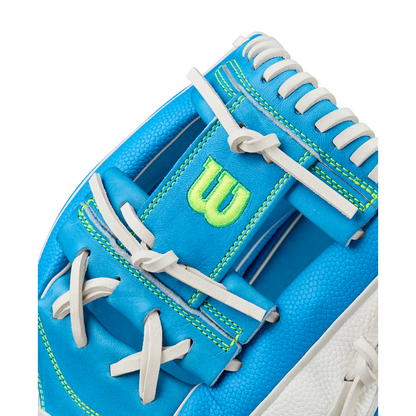 Close-up of the Wilson A2000 H12SS 12" Fastpitch Glove, featuring blue and white design, white laces, bright green stitching, and a bold green “W” logo on the wrist strap. Model: WBW10348612.