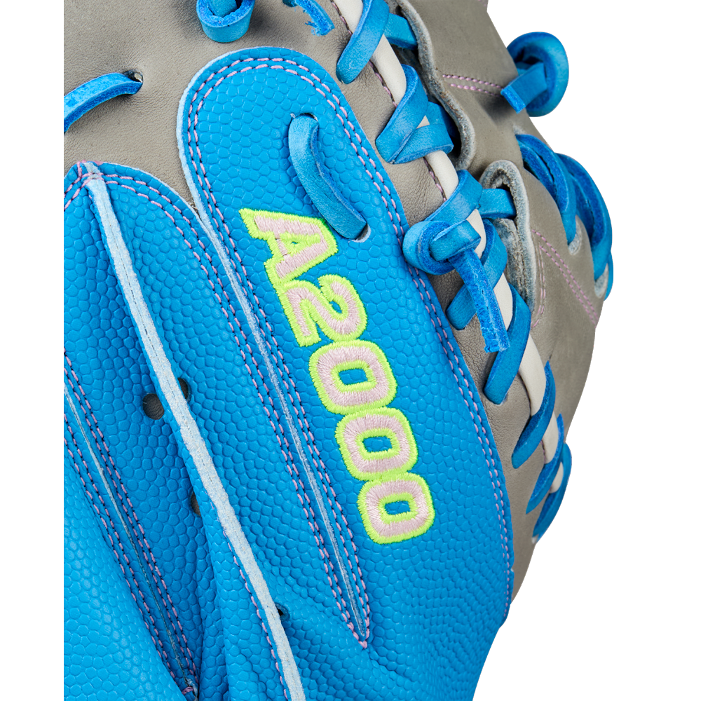 Close-up of a Wilson A2000 FPCM23 34" Fastpitch Catcher's Mitt (WBW10349134), featuring blue and gray leather, blue laces, and bright yellow-green A2000 embroidery, by Wilson.