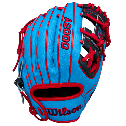 The Wilson A2000 PF11SS 11" Baseball Glove (WBW10394011) features a blue design with red lacing, black accents, bold stitching, and Pro Stock leather, shown against a plain light background.