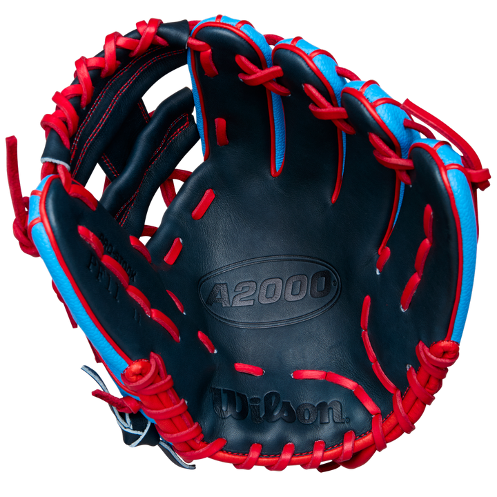 The Wilson A2000 PF11SS 11" Baseball Glove by Wilson, shown open with the palm up against a white background, features blue and black Pro Stock leather, red laces, and Pedroia Fit Technology for infield use.