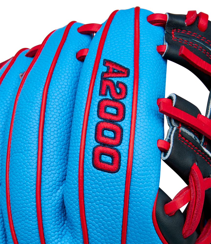 Close-up of a Wilson A2000 PF11SS 11" Baseball Glove with blue Pro Stock leather, red stitching, "A2000" embroidered in red, plus black and red laces. Pedroia Fit design by Wilson.