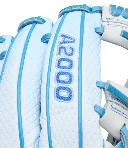 Close-up of the Wilson A2000 H12SS 12" Fastpitch Glove (WBW10394612), a white and light blue glove made with Pro Stock leather, textured stitching, and "A2000" embroidered in blue on the back.