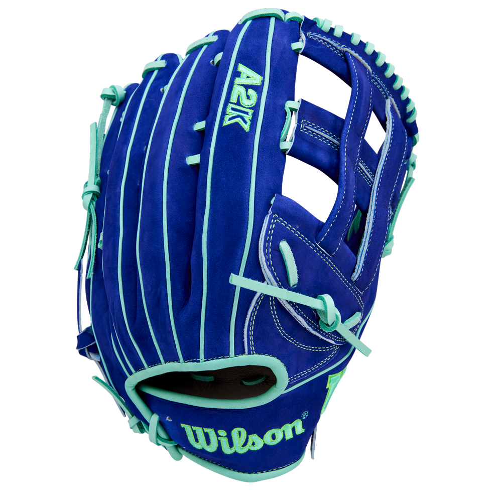 The Wilson A2K JS22 12.75" Juan Soto GM Baseball Glove (WBW1039531275) features royal blue Pro Stock Select leather, teal laces and accents, white stitching, and an embroidered Wilson logo on the wrist strap for top-tier durability and feel.