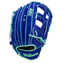 The Wilson A2K JS22 12.75" Juan Soto GM Baseball Glove (WBW1039531275) features royal blue Pro Stock Select leather, teal laces and accents, white stitching, and an embroidered Wilson logo on the wrist strap for top-tier durability and feel.