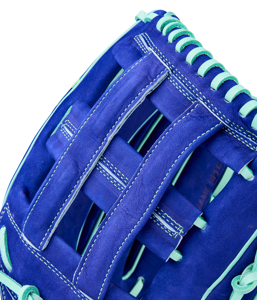 Close-up of the Wilson A2K JS22 12.75" Juan Soto GM Baseball Glove, featuring blue Pro Stock Select leather, light blue laces and stitching, woven webbing, and inspired by Juan Soto’s iconic glove.