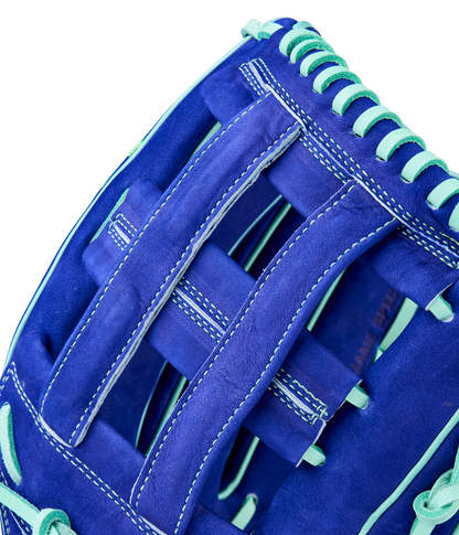 Close-up of the Wilson A2K JS22 12.75" Juan Soto GM Baseball Glove, featuring blue Pro Stock Select leather, light blue laces and stitching, woven webbing, and inspired by Juan Soto’s iconic glove.