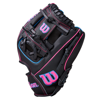 The Wilson A1000 DP15 11.5" Baseball Glove (WBW103956115) is a black full grain leather infield glove with pink and blue stitching, pink "W" logos on the thumb and back, shown on a plain white background.