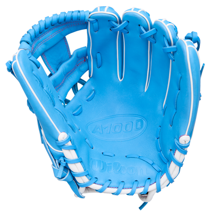 A Wilson A1000 1786 11.5" baseball glove (WBW103957115) in bright blue with white lacing and stitching, displayed palm side up against a white background.