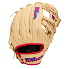 The Wilson A1000 1975 11.75" Baseball Glove (WBW1039591175) by Wilson features a tan design with red trim, blue Wilson logos on the wrist strap and back, brown laces, and an open web, displayed against a plain white background.