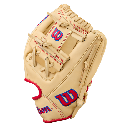 The Wilson A1000 1975 11.75" Baseball Glove (WBW1039591175) features a tan design with red laces and blue-and-red Wilson logos on the thumb and wrist, displayed against a plain white background.