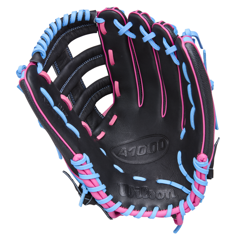 The Wilson A1000 1892 12.25" Baseball Glove (WBW1039621225) by Wilson is a black outfield glove with bright blue and pink laces and stitching, made from Full Grain leather, shown open with the palm up against a white background.