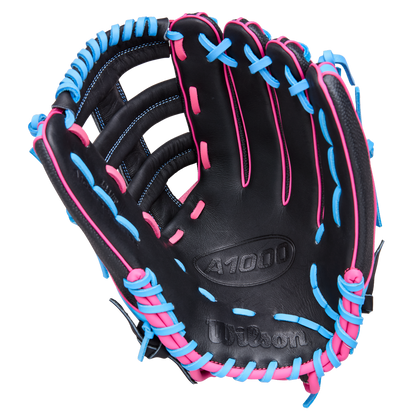 The Wilson A1000 1892 12.25" Baseball Glove (WBW1039621225) by Wilson is a black outfield glove with bright blue and pink laces and stitching, made from Full Grain leather, shown open with the palm up against a white background.