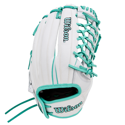 The Wilson A1000 T125 12.5" Fastpitch Glove (WBW103970125) is a white youth softball glove made from full grain leather with teal laces and accents. The Wilson logo is displayed on the top and near the wrist, shown on a plain white background.