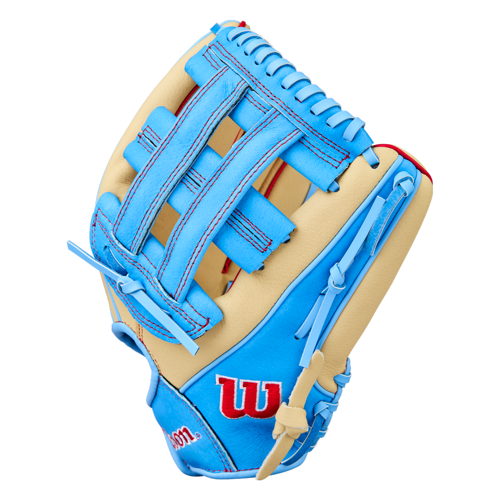 A close-up of the Wilson A450 12″ Youth Baseball Glove (model WBW10398312), showcasing its tan and bright blue top grain leather construction, red stitching accents, and a prominent W logo on the side.