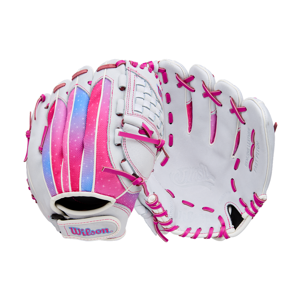A pair of white Wilson Flash 11.5" Fastpitch Gloves (WBW103985115) with pink laces and accents are shown. The left glove displays a colorful pink, purple, and blue strip on the back, both set against a plain white background.