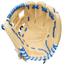 A tan Wilson A2000 BWJ7 11.75" Bobby Witt Jr. GM Baseball Glove (WBW1040681175) features blue lacing on the edges and fingers, Pro Stock leather, and is shown open with the palm forward, just like Bobby Witt Jr.'s infield glove.