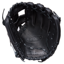 The Wilson A2000 1788 11.25" Baseball Glove (WBW1041051125) is shown open, featuring black Pro Stock Leather, visible lacing, and Wilson branding on the palm.