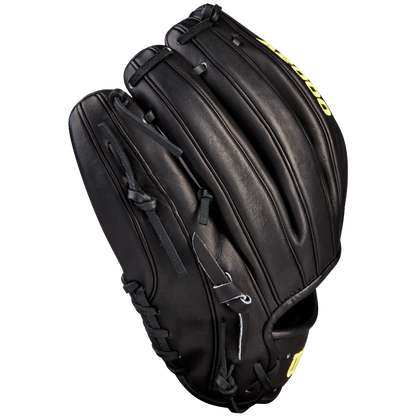 A Wilson A2000 1789 11.5" black infield baseball glove, crafted from Pro Stock leather with visible stitching and laces, is displayed on a plain white background.