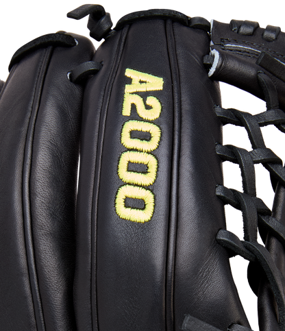 Close-up of the Wilson A2000 1789 11.5" Baseball Glove (WBW104106115), crafted with Pro Stock leather. This black Wilson glove features yellow "A2000" stitching, black laces, and detailed craftsmanship.