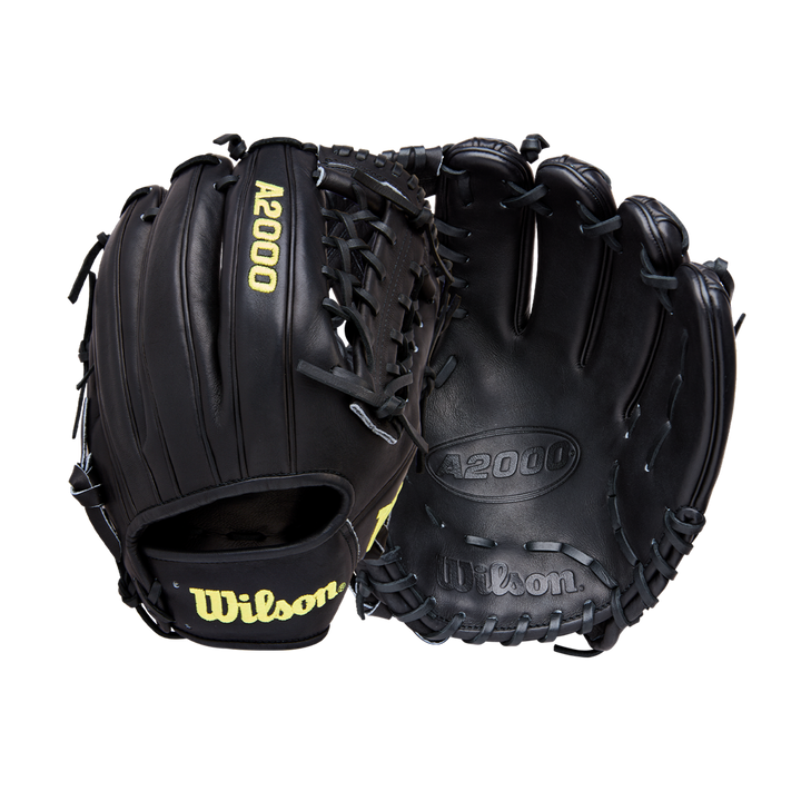 Two black Wilson A2000 1789 11.5" baseball gloves (model WBW104106115) with yellow Wilson branding are shown—one with the palm side, the other with the back—highlighting detailed stitching and Pro Stock leather lacing.