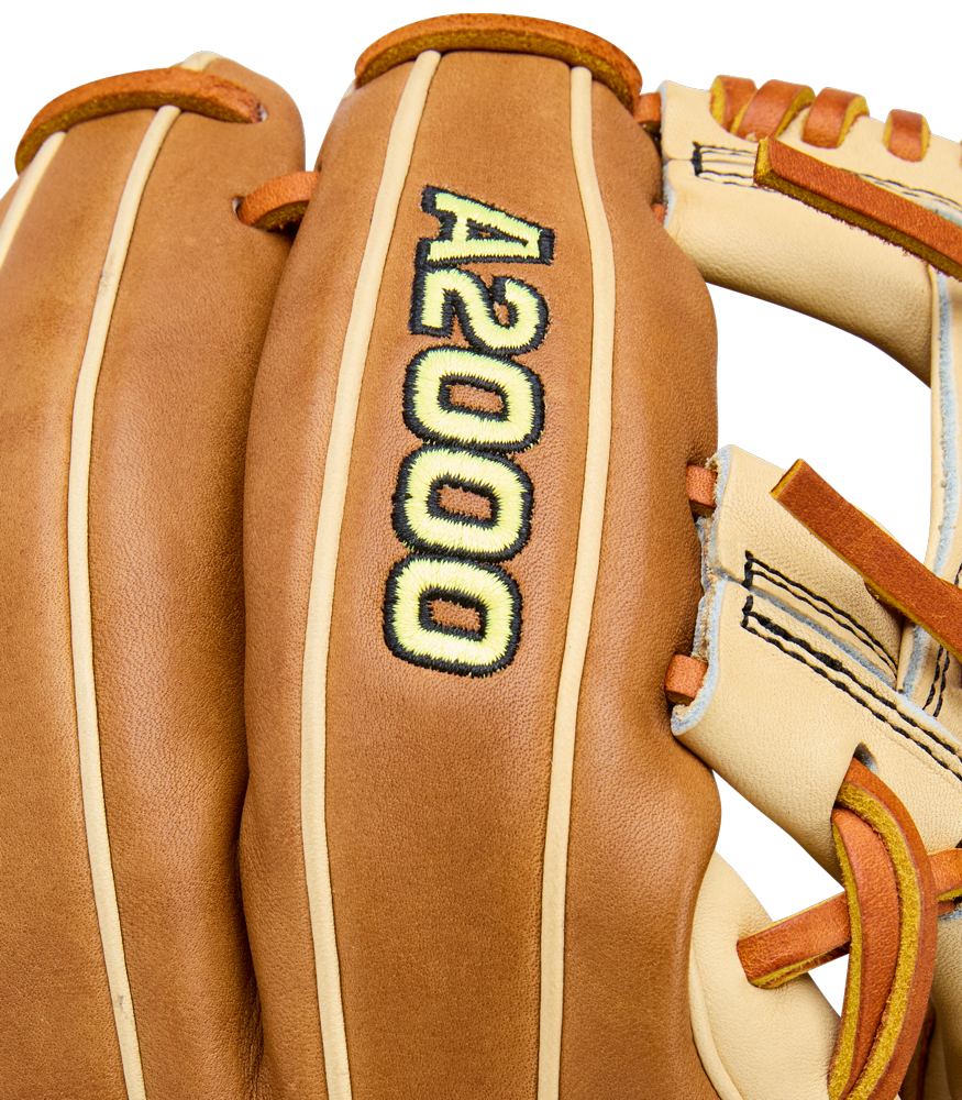 Close-up of the Wilson A2000 1786 11.5" Baseball Glove, crafted from Pro Stock Leather with “A2000” embroidered in yellow and black on the back, featuring detailed stitching and tan laces.