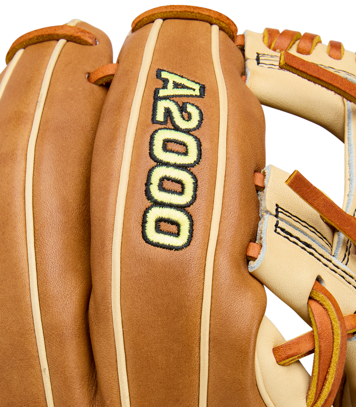 Close-up of the Wilson A2000 1786 11.5" Baseball Glove, crafted from Pro Stock Leather with “A2000” embroidered in yellow and black on the back, featuring detailed stitching and tan laces.