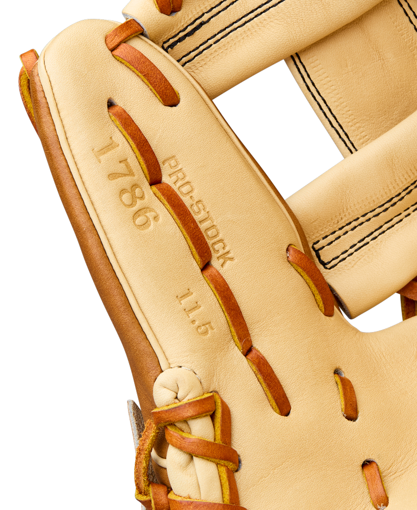 Close-up of the Wilson A2000 1786 11.5" Baseball Glove, crafted from Pro Stock Leather, featuring embossed '1786', 'PRO STOCK', and '11.5"', plus brown laces and detailed stitching. Model: WBW104109115.