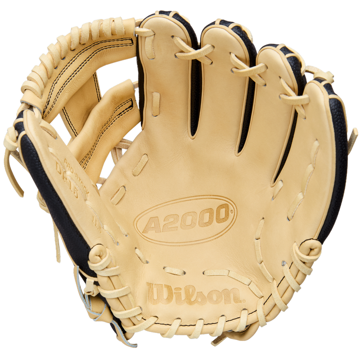 The Wilson A2000 DP15SS 11.5" Baseball Glove (WBW104110115) in tan and black features Pedroia Fit Technology for a snug, comfortable feel and is shown open, palm up, with visible stitching and logos against a white background.