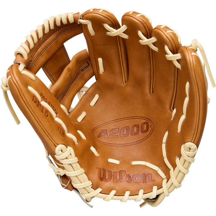 A tan Wilson A2000 DP15 11.5" Baseball Glove (WBW104111115) with cream laces, showing the palm side and Wilson branding embossed on premium Pro Stock Leather.
