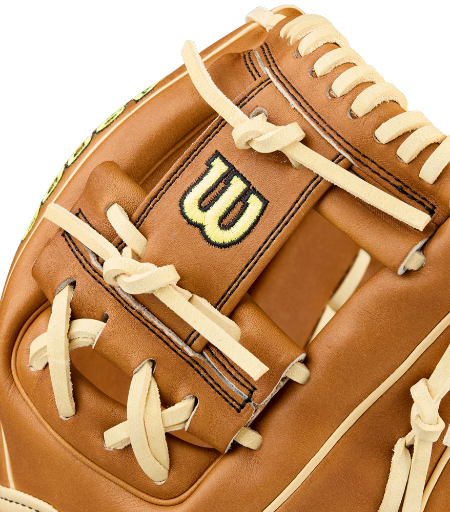 Close-up of the Wilson A2000 DP15 11.5" Baseball Glove, crafted from Pro Stock Leather with cream laces, detailed stitching, and a black-and-yellow Wilson logo on the back of the brown glove.