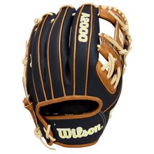 A black and tan Wilson A2000 1975SS 11.75" baseball glove with cream laces, crafted with SuperSkin, features the Wilson brand and model number WBW1041121175 on the back.