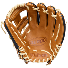 The Wilson A2000 1975SS 11.75" Baseball Glove (WBW1041121175) features a brown and tan leather design with white lacing, open and showing the embossed Wilson brand and model inside the palm, built for premium performance.