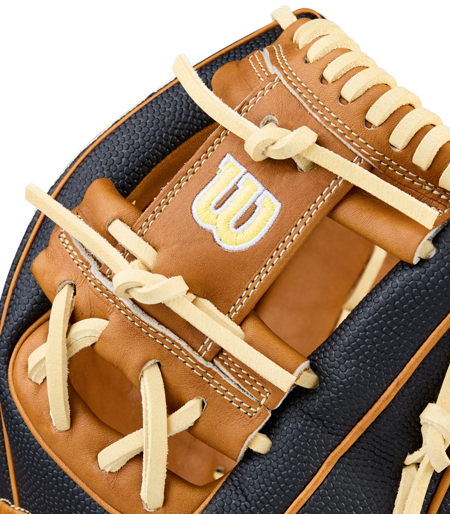 Close-up of the Wilson A2000 1975SS 11.75" Baseball Glove (WBW1041121175) by Wilson, featuring brown and black leather, intricate stitching, cream laces, and the signature yellow and white W logo.