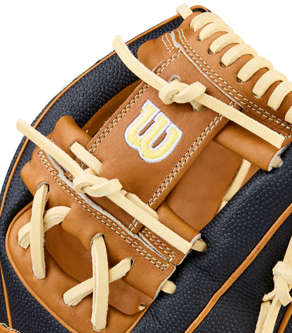 Close-up of the Wilson A2000 1975SS 11.75" Baseball Glove (WBW1041121175) by Wilson, featuring brown and black leather, intricate stitching, cream laces, and the signature yellow and white W logo.