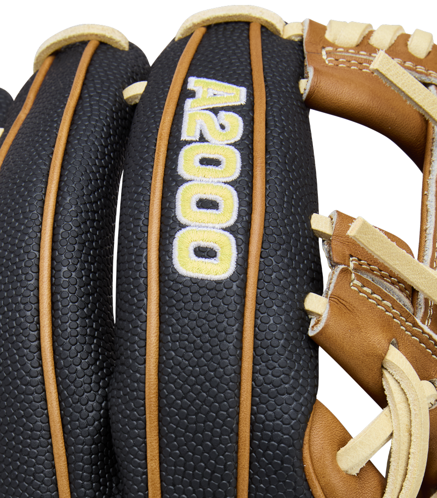 Close-up of a Wilson A2000 1975SS 11.75" Baseball Glove (WBW1041121175), featuring black and brown textured leather with yellow and white A2000 stitching on the finger. White background.