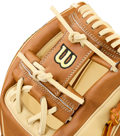 A close-up of the Wilson A2000 1975 11.75" Baseball Glove (WBW1041131175) highlights its tan and brown Pro Stock Leather, intricate stitching, laces, and the signature embroidered W logo.