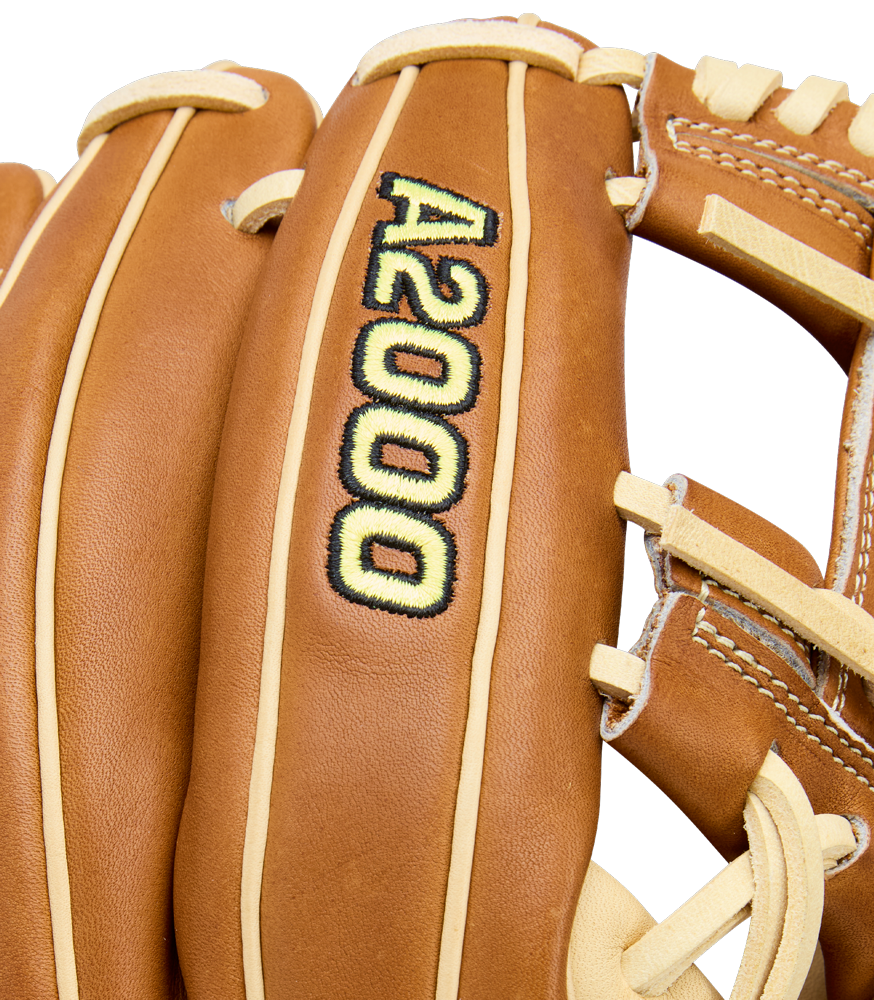 Close-up of a Wilson A2000 1975 11.75" baseball glove, made from Pro Stock Leather with tan laces and black/yellow A2000 embroidery on the finger.
