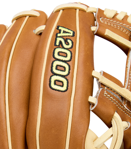 Close-up of a Wilson A2000 1975 11.75" baseball glove, made from Pro Stock Leather with tan laces and black/yellow A2000 embroidery on the finger.