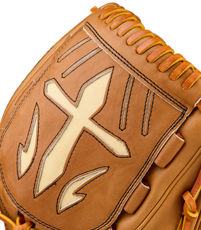 Close-up of a Wilson A2000 B23 12" Baseball Glove (WBW10411712), crafted from Pro Stock Leather in brown with cream and black stitched designs, a prominent cross, and unique decorative accents on the glove’s surface.