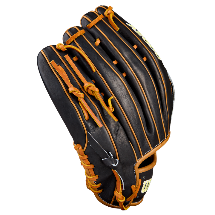 The Wilson A2000 1750 12.5" Baseball Glove (WBW104121125) is shown open against a white background, highlighting its black and brown Pro Stock leather, tan laces, and outfield webbing.
