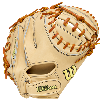 The Wilson A2000 PF33 33" catcher's mitt, crafted from Pro Stock Leather, features a tan design with brown laces, black stitching, and the Wilson logo in yellow and black on the thumb and wrist.