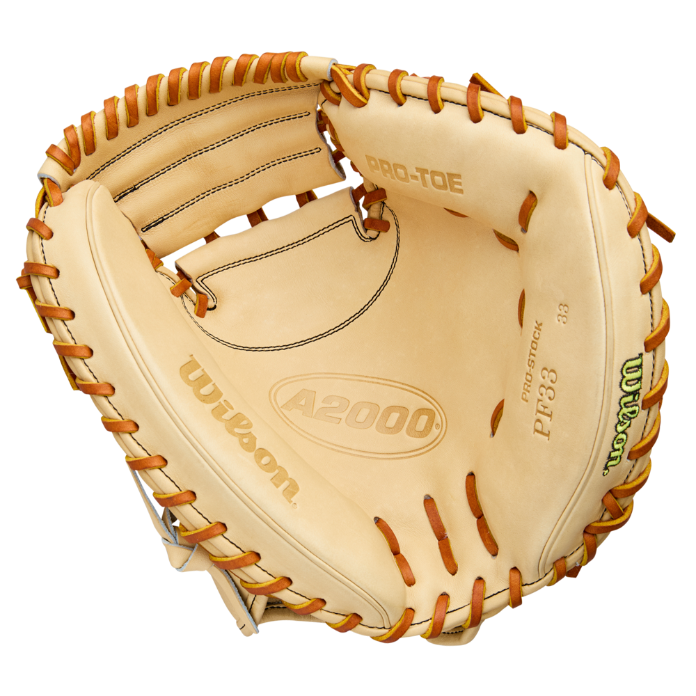 A Wilson A2000 PF33 33" Catcher's Mitt by Wilson, crafted from Pro Stock Leather with brown laces and PRO-TOE labels, is shown from above to highlight its deep pocket and wide webbing.