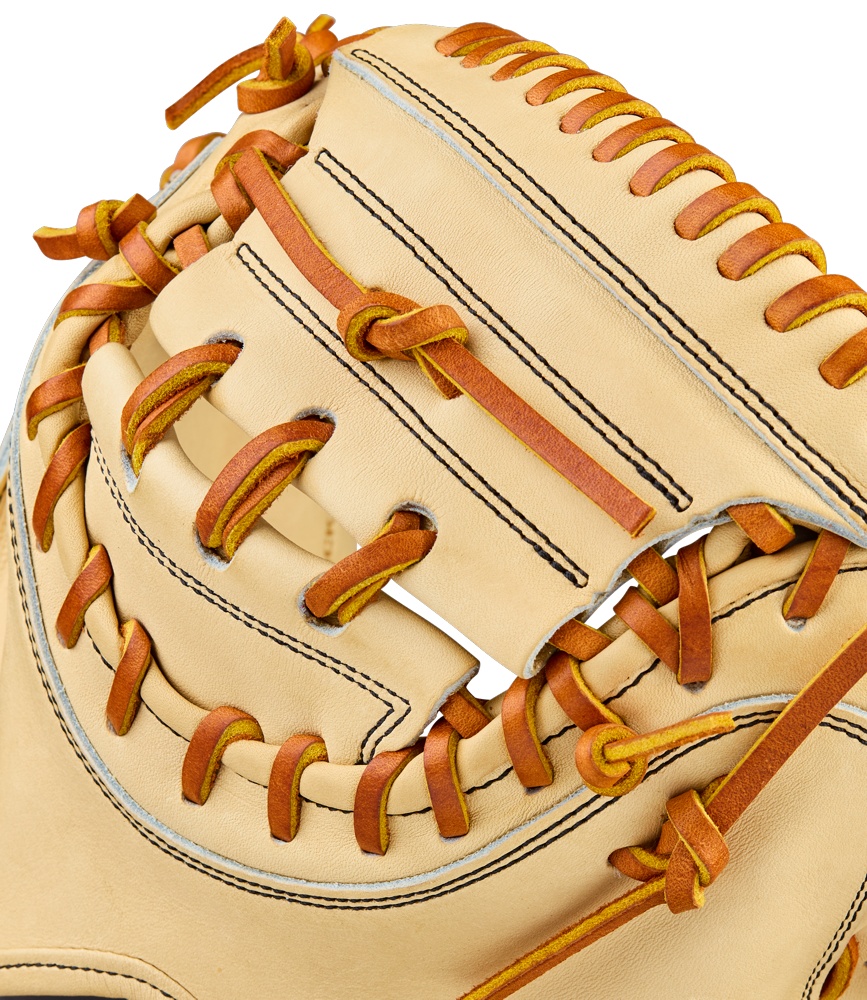Close-up of the Wilson A2000 PF33 33" Baseball Catcher's Mitt (WBW10412733) in beige with brown laces, showcasing Pro Stock Leather webbing and detailed stitching.
