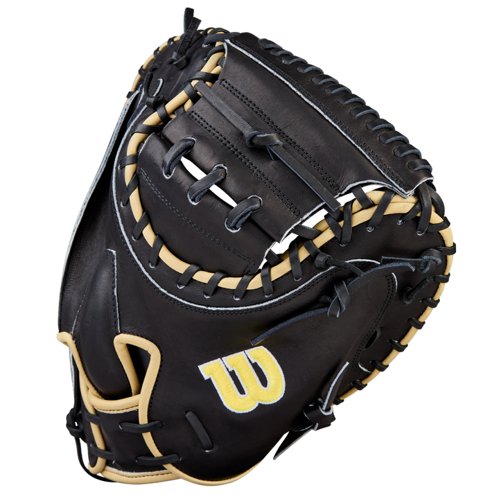 The Wilson A2000 1734 34" Baseball Catcher's Mitt (WBW10412834) features black and tan Pro Stock Leather, white stitching, and a yellow W logo on the thumb, shown against a plain white background.